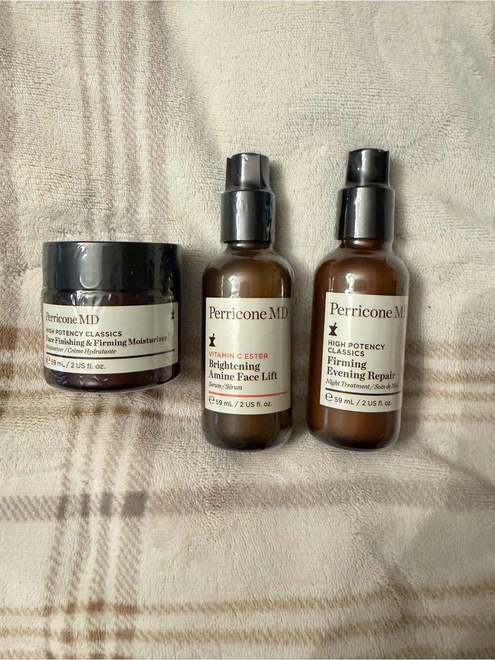 Perricone MD brown and cream facial serum duo with black pumps